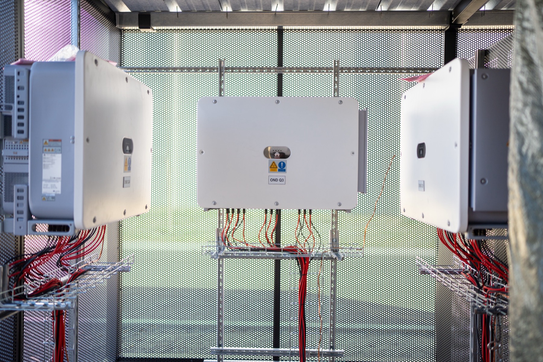 Technical room of a solar plant: inverters and cabling installed by the group's teams